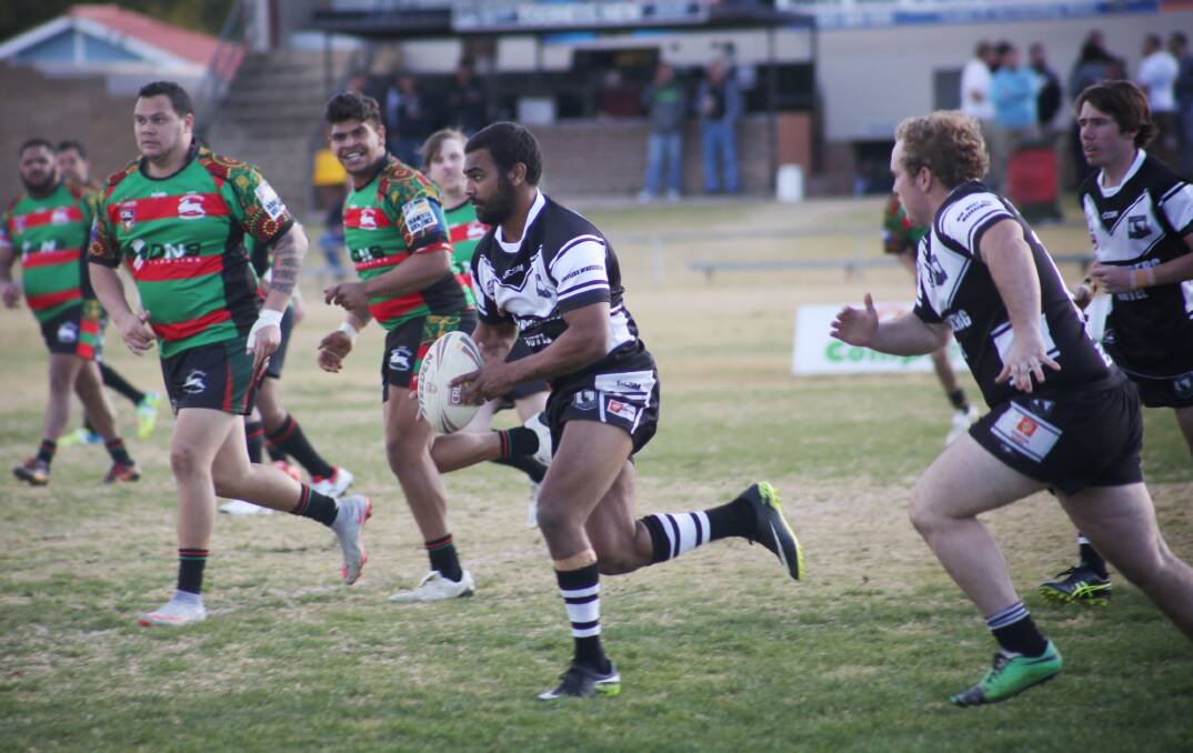 ON THE FLY: Forbes' Jesse Wighton darts around the Westside defence during the Magpies massive win on Sunday, with Farren Lamb scoring six tries in the 80-point victory.