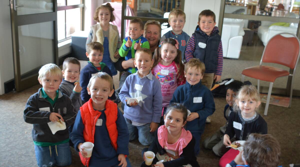 Little Saints: Children from the St Mary's Early Learning class visited Maranatha Aged care facility. They are pictured with Maranatha manager Debra Wells. 
