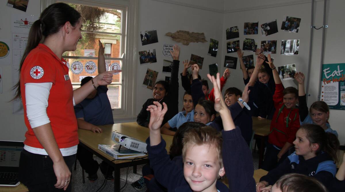 Healthy masterchefs: Gabriel Barrett gets plenty of questions from children at Wellington Public School.