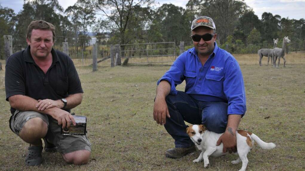 Landholder Leroy Woods with Richard Ali, senior bio-security officer Hunter LLS, on the Woods family property at Lower Belford where dogs have attacked and killed sheep.