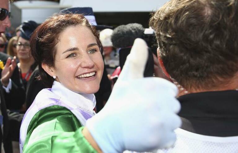 Michelle Payne celebrates her winning ride at the 2015 Melbourne Cup. . Pic: Michael Dodge/Getty Images