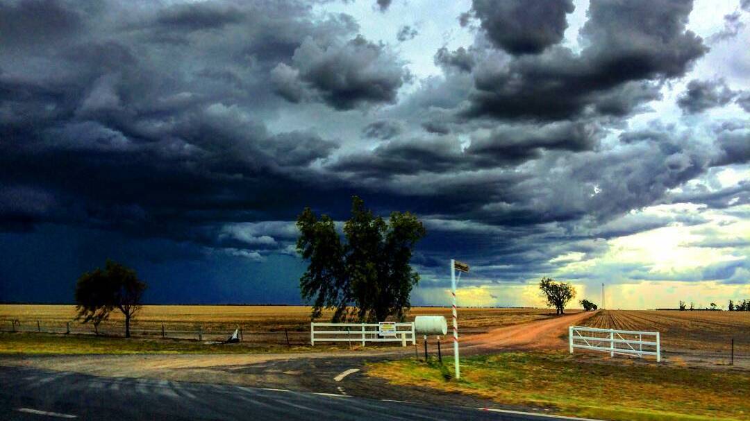 Pic by @adriennehartnett: "riving into the storm between Goondiwindi and Moree."