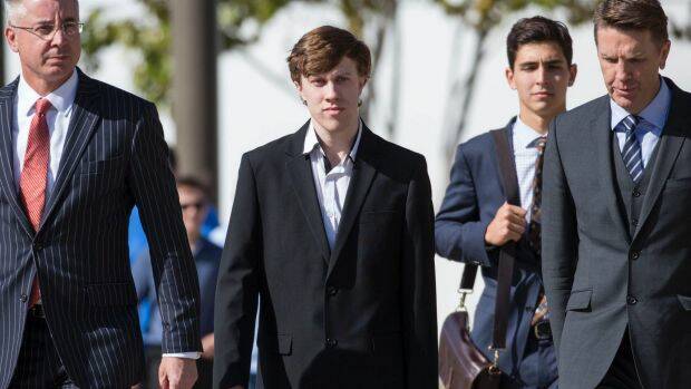 The 21-year-old Joshua Thorburn (centre)will face three months' jail over the alleged murder. Photo: Glenn Hunt
