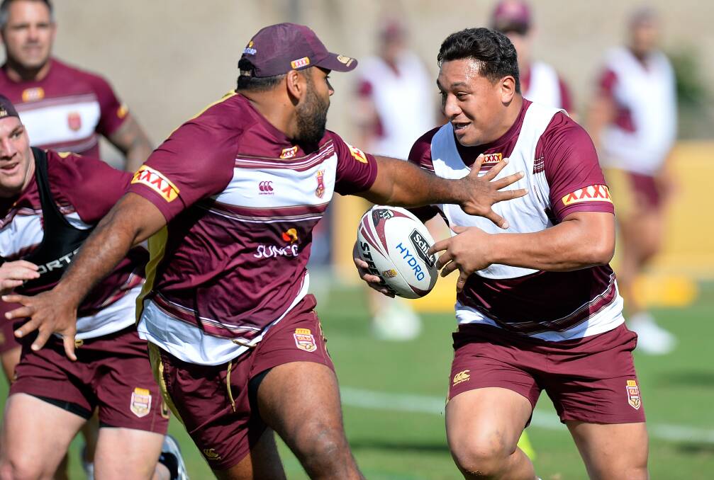 Josh Papalii attempts to break away from the defence of Sam Thaiday during a Queensland Maroons State of Origin training session. (Photo by Bradley Kanaris/Getty Images)