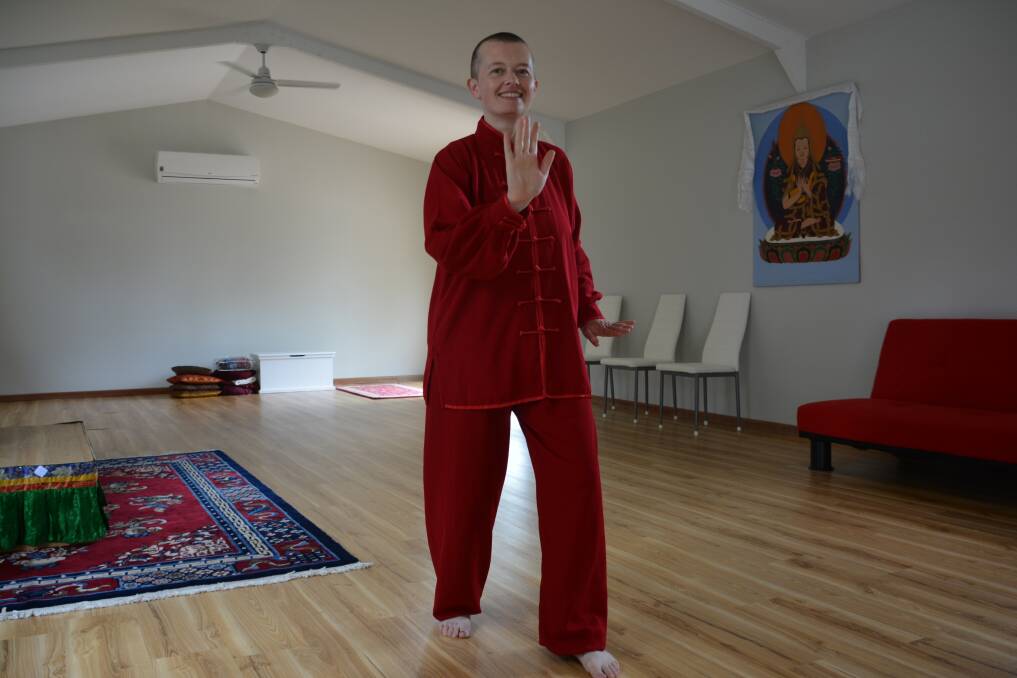 Choden Thubten in the newly finished meditation room. Photo: NICK GRIMM