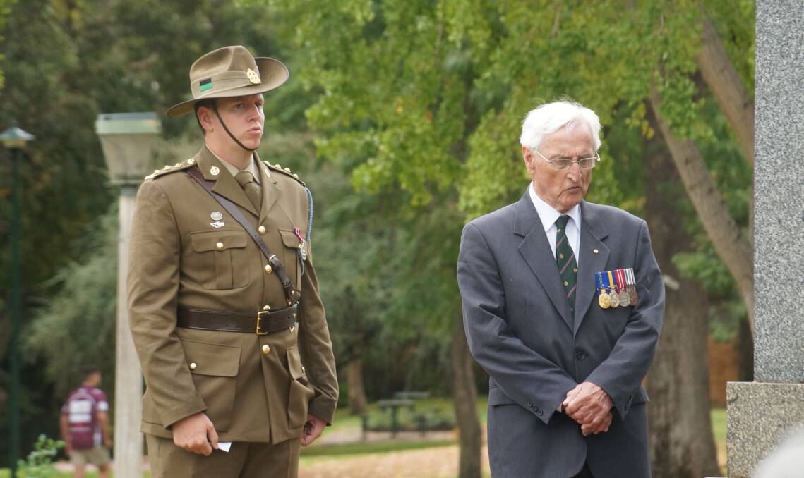 Captain Frank Tamsitt (left) spoke at the Anzac Day Ceremony in Cameron Park.
