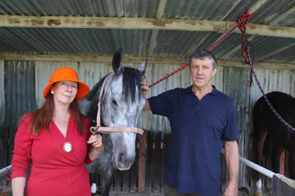Owner Joaquin McLennan with her horse Kalisa's Secret and trainer Terry Fahey. Photo: CONTRIBUED