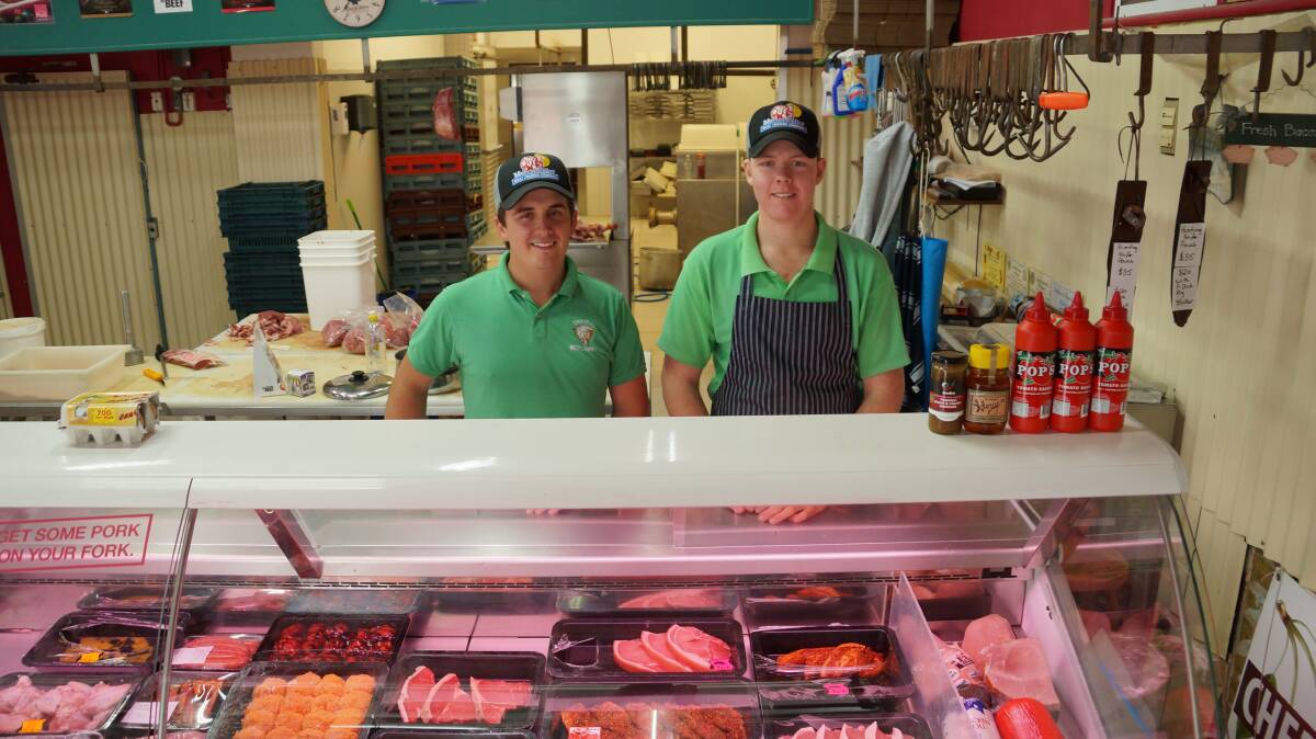 GROWING THE BUSINESS: Central Butchery owner Josh Fisk with second-year apprentice Matt Purcell. Photo: NICK GRIMM