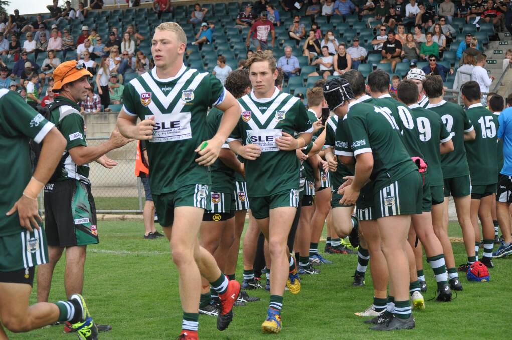 Brock Naden (centre) was a standout for the Rams in their big win on Saturday. Photo: NICK MCGRATH