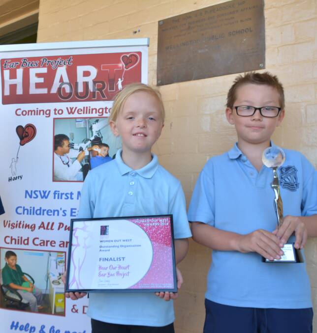 GOOD WORK REWARDED: Emily Manning and Jayden Barker with the Hear Our Heart's recent awards. Photo: NICK GRIMM