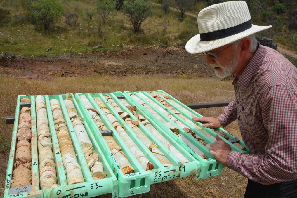 IN IT FOR THE FIND: Dr Mike Jones with some of the mineral samples from the Commonwealth site. Photo: NICK GRIMM.