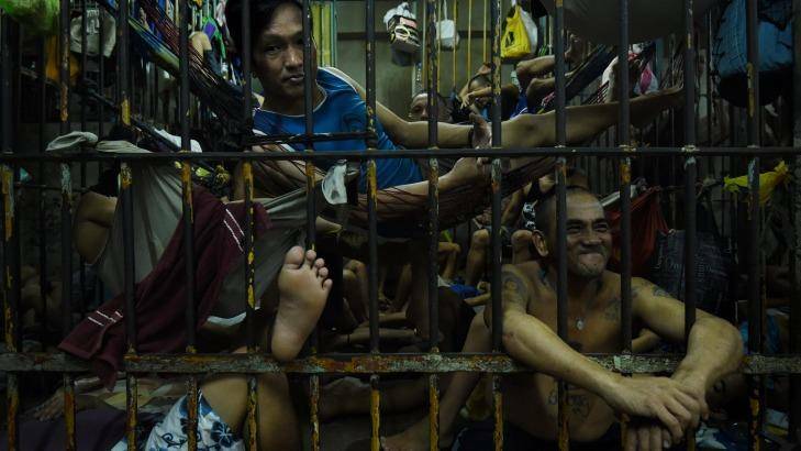 Prisoners inside a cell in Manila Police Headquarters, Philippines. Photo: Kate Geraghty.