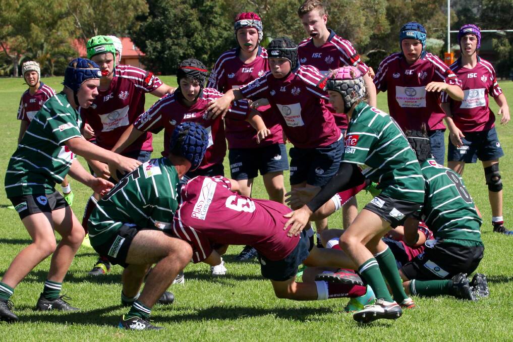 PUSHING THROUGH: A tough try helped the Cowboys under 15s to victory on the weekend. Photo: JO IVEY.