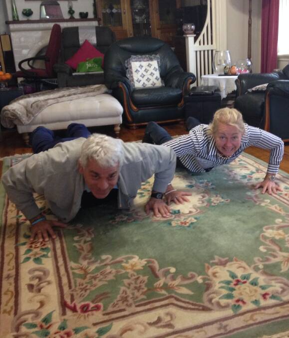 Challenge accepted: Brett Tolhurst and Lorraine Gould complete another set of push-ups in support of soldiers and veterans. Photo contributed.
