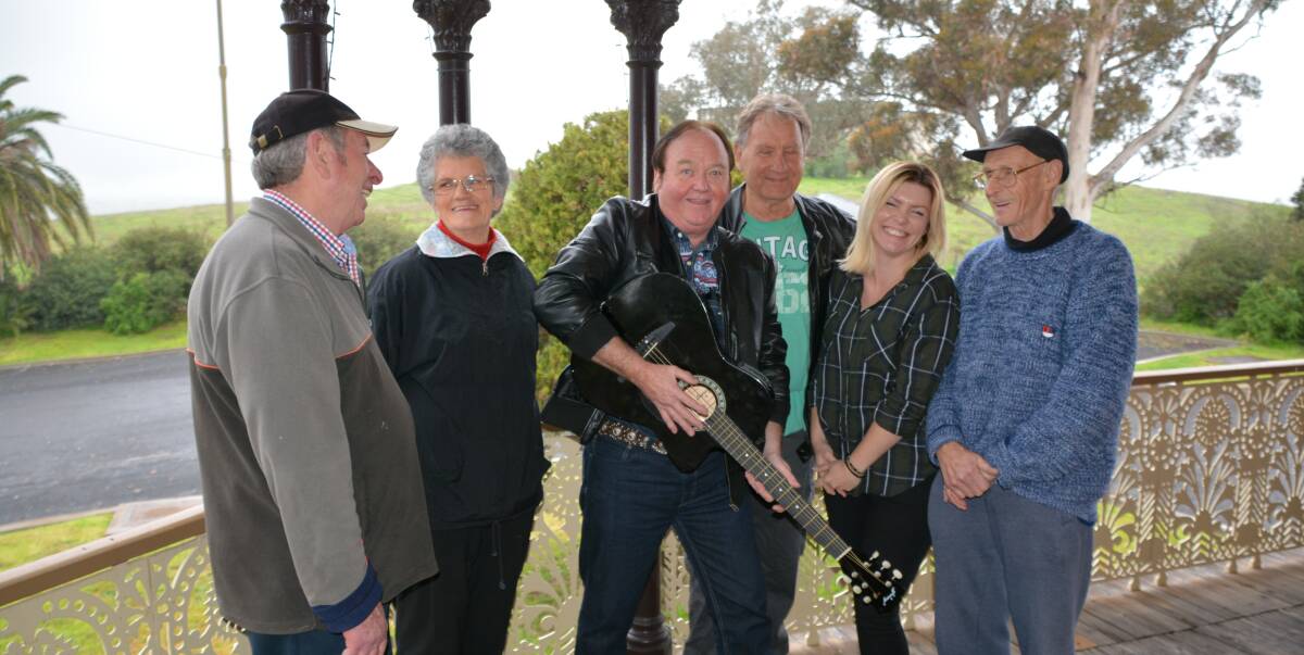 Warming up: Noel Grimes, Delma Gersbach, Chris Rodgers, Mick Austin, Tracie Charman and Barry Dickerson meet at Hermitage Hill to discuss plans for the Arts and Sculpture Festival. Photo: FAYE WHEELER