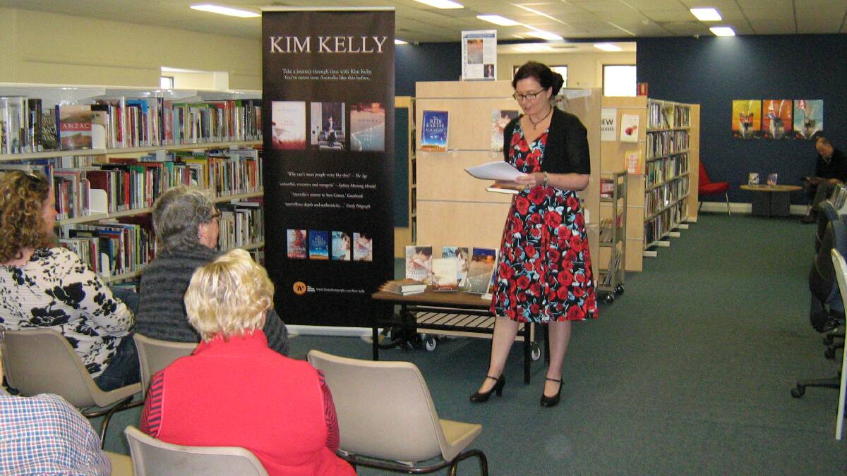 A writer's insights: Author Kim Kelly shares her experiences during a visit to the Wellington library on October 6. Photo contributed.