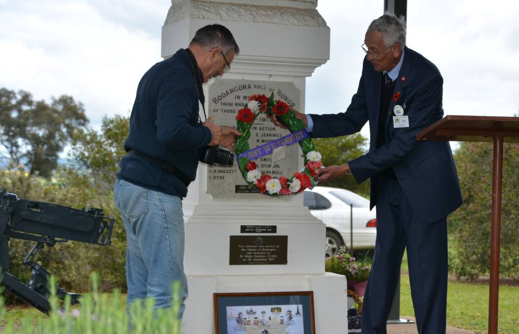Remembrance: Martial Delebarre OAM and service organiser Maurice Campbell lay a wreath at the Fromelles Memorial Service held at Bodangora, 100 years after the battle. Photo: FAYE WHEELER. 