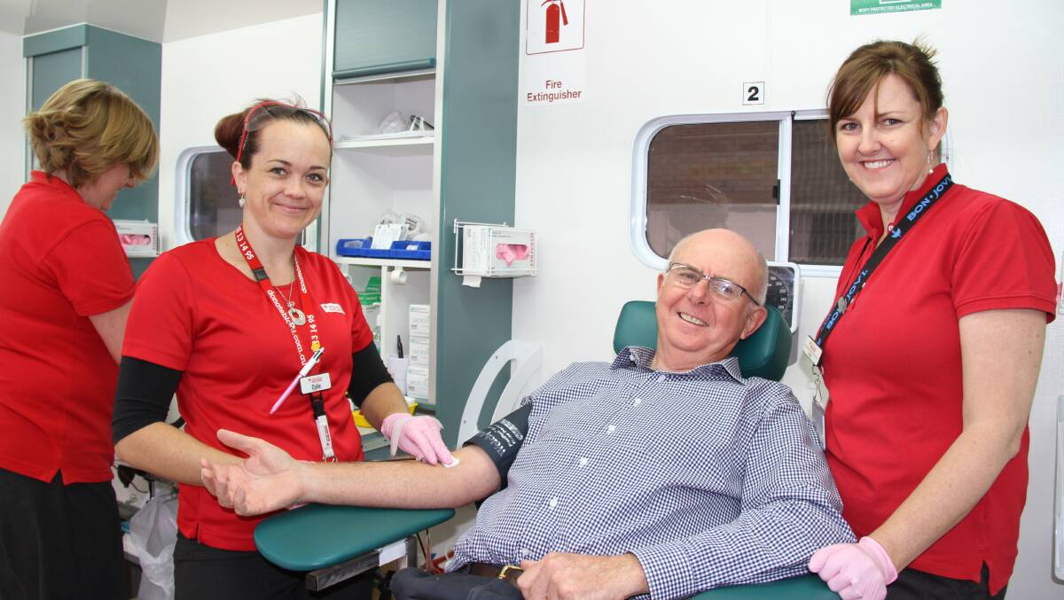 Wellington blood donor John Southwell rolls up his sleeves when the mobile donor centre came to town earlier this year. File photo.