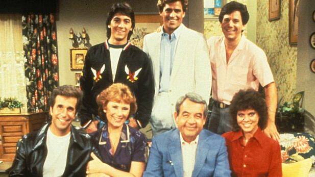 The cast of Happy Days . The Fonz - Henry Winkler , Chachi - Scott Baio , Joanie - Erin Moran , Howard Cunningham - Tom Bosley, Marion Cunningham - Marion. 
