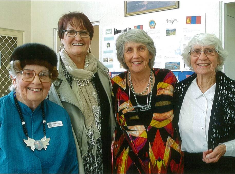 International Day: Macquarie Group members Helen Norris and Kathie Carolan, secretary Bev Cameron and president Pat Bell. Photo: CONTRIBUTED