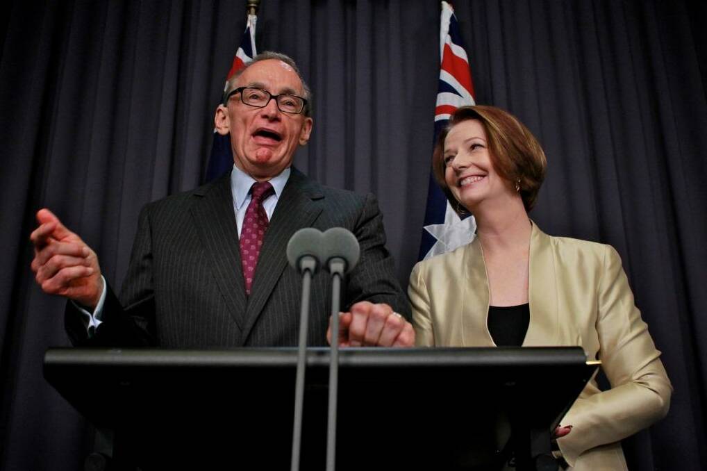 Happier times: then prime minister Julia Gillard announces former NSW premier Bob Carr as her foreign minister in March 2012. Mr Carr switched his allegiance to Kevin Rudd before the 2013 federal election. Photo: Andrew Meares