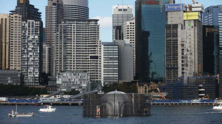 Still point of war comes to life under the dome: <i>Nomanslanding</i> floating in Sydney Harbour. Photo: Fiona Morris