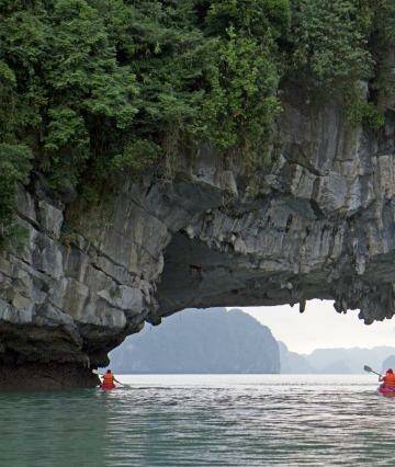 Under a sea arch in Halong Bay. Photo: Andrew Bain