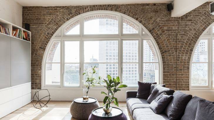 The beautiful arched windows are a big feature of the apartment. Photo: Supplied