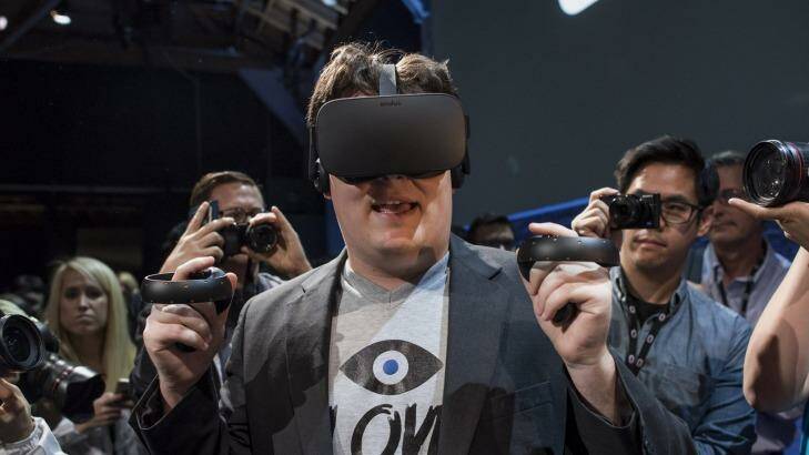 Facebook has started taking orders on Oculus Rift headsets, demonstrated here by their creator Palmer Luckey. Photo: David Paul Morris