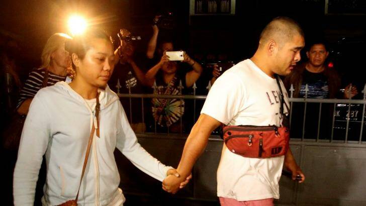 Andrew Chan's girlfriend Febyanti Herewila and Michael Chan, brother of Bali nine heroin smuggler, as they leave Kerobokan Prison after being refused one final visit before the transfer by prison authorities.  Photo: Kate Geraghty