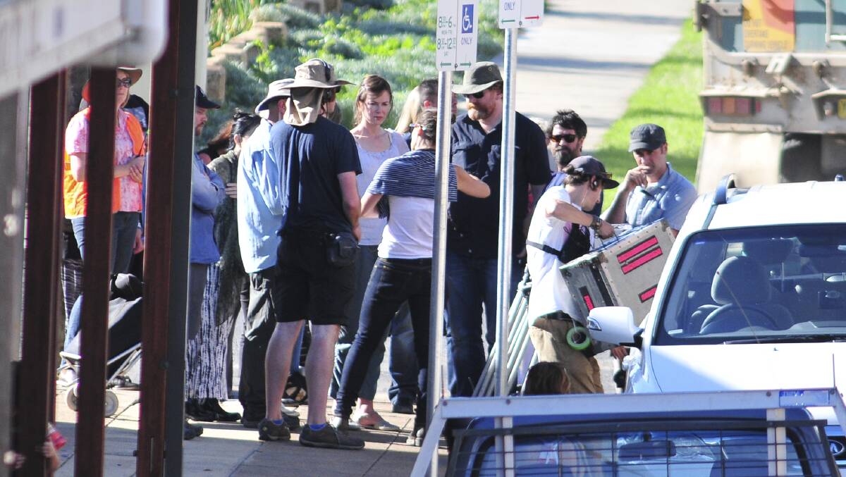 STAR IN OUR MIDST: Nicole Kidman, pictured surrounded by the crew, was hard at work in Canowindra on Monday, shooting scenes for Strangerland. Photo: JUDE KEOGH