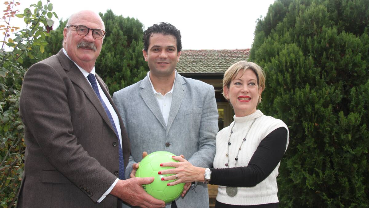 Wellington High School prinicpal Don Harvey, Real Madrid Foundation project manager Inigo Arenillas and Victoria Ugarte