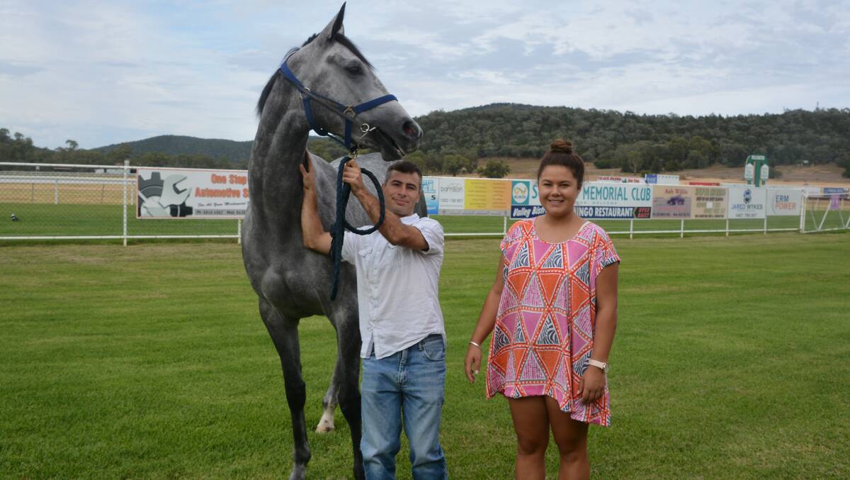 Daniel Pitomac with grey filly Shades of Pearl and local fashionista Abbey Lousick all ready for Wellington's biggest racing weekend