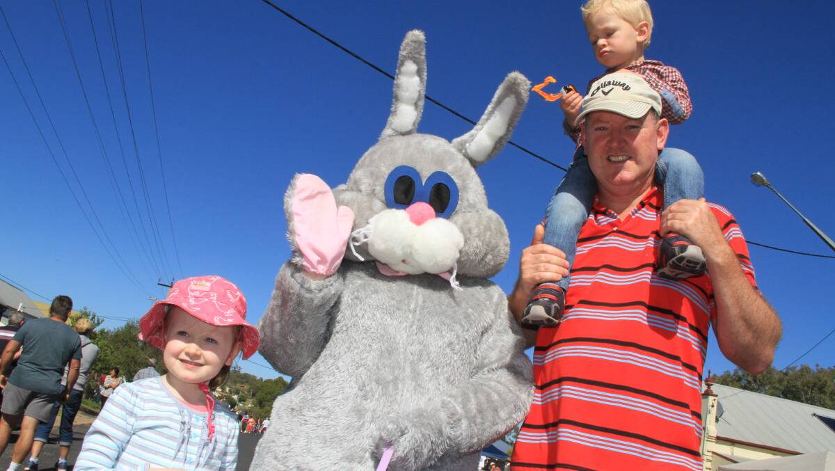 Maxine, Harrison and George Macarthur with the Easter Bunny at the Man from Ironbark Festival.