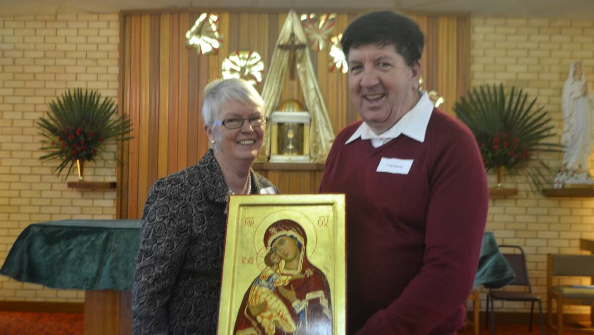 Judy Vaughan with Father Tony Hennessy