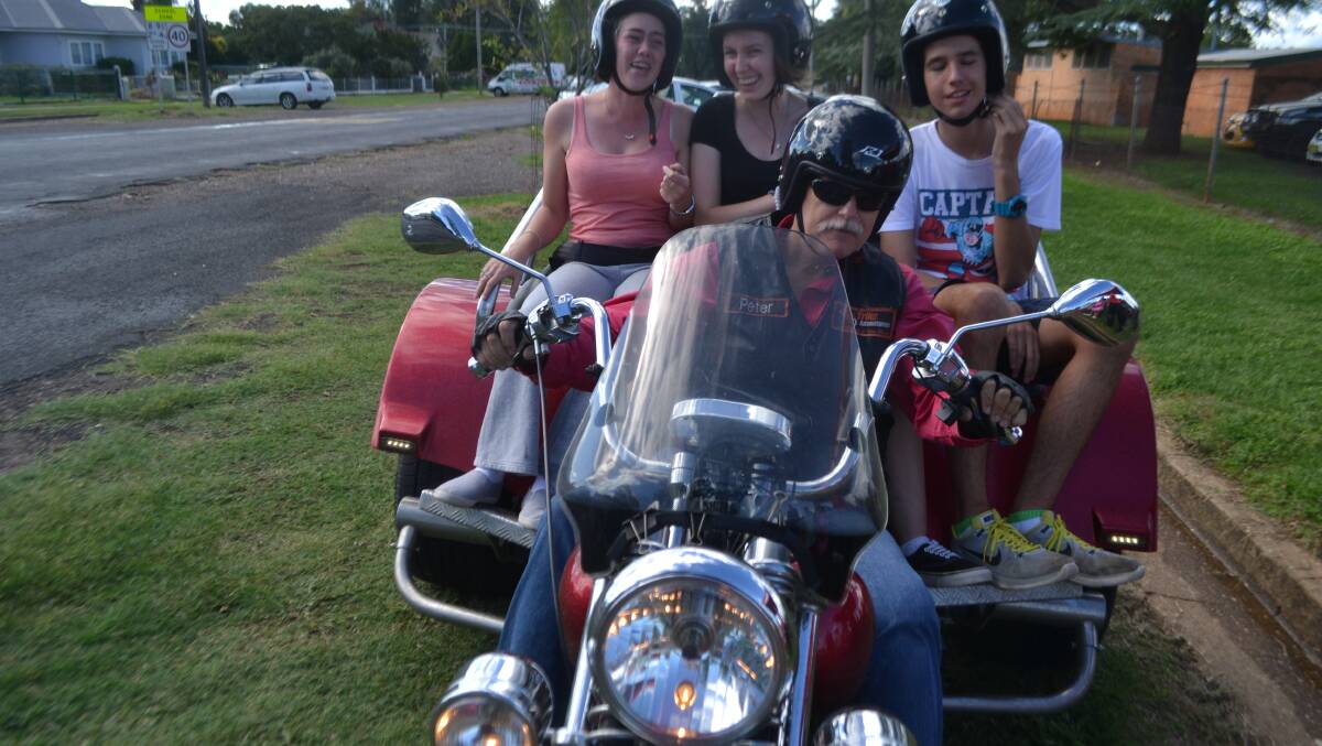Christy Simmons, Ruth Moore and Lachlan Atkinson enjoyed trike rides