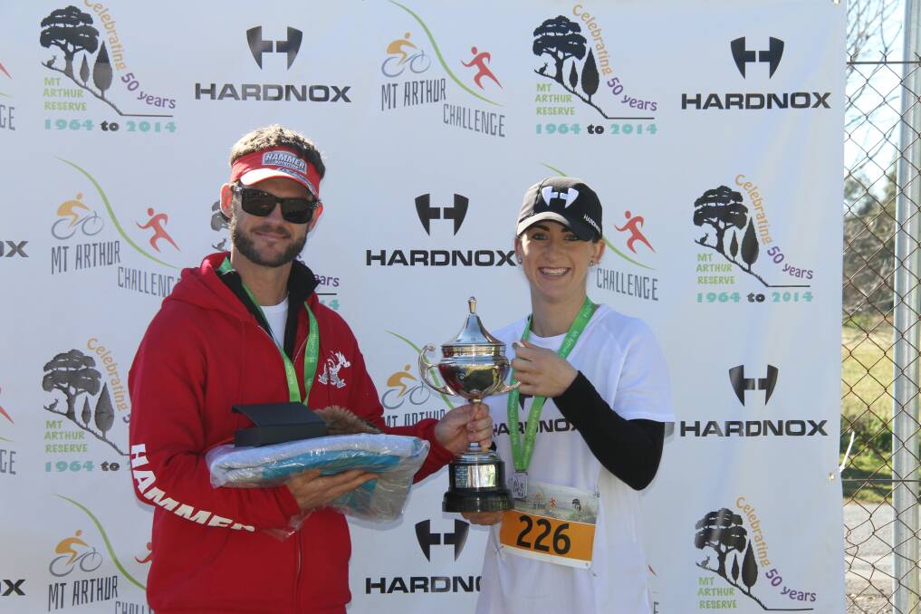 Mt Arthur Challenge winner Wes Gibson and Kellsey Melhuish who finished second in the 5km fun run and also with the Hardnox group was major sponsor.