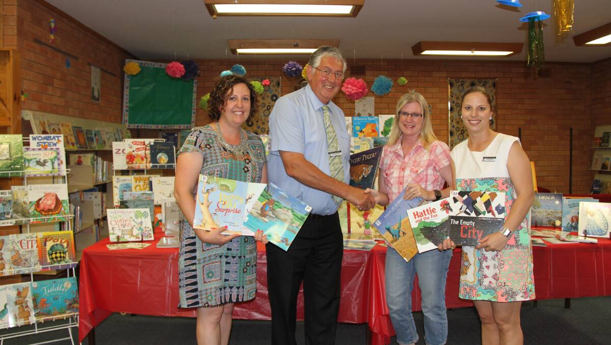 Principal Denis Anderson with Library staff