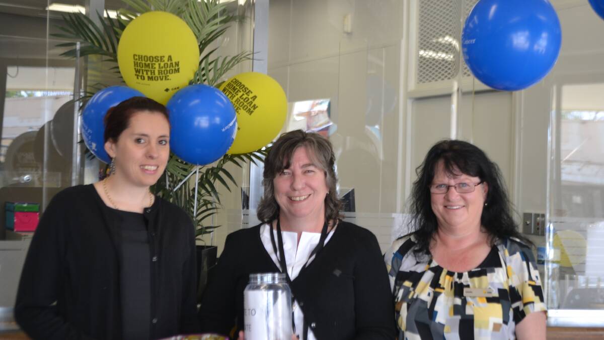 Lynn Freeman (middle) and her staff at the Commonwealth Bank in Wellington
