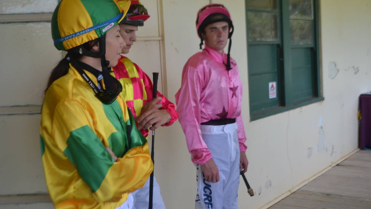 jockeys getting ready for race 2 on day one of the carnival