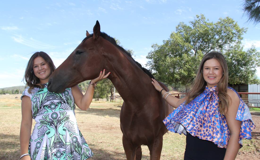 Abbey and Kate Lousick with Boot Yearling raffle horse Husson
