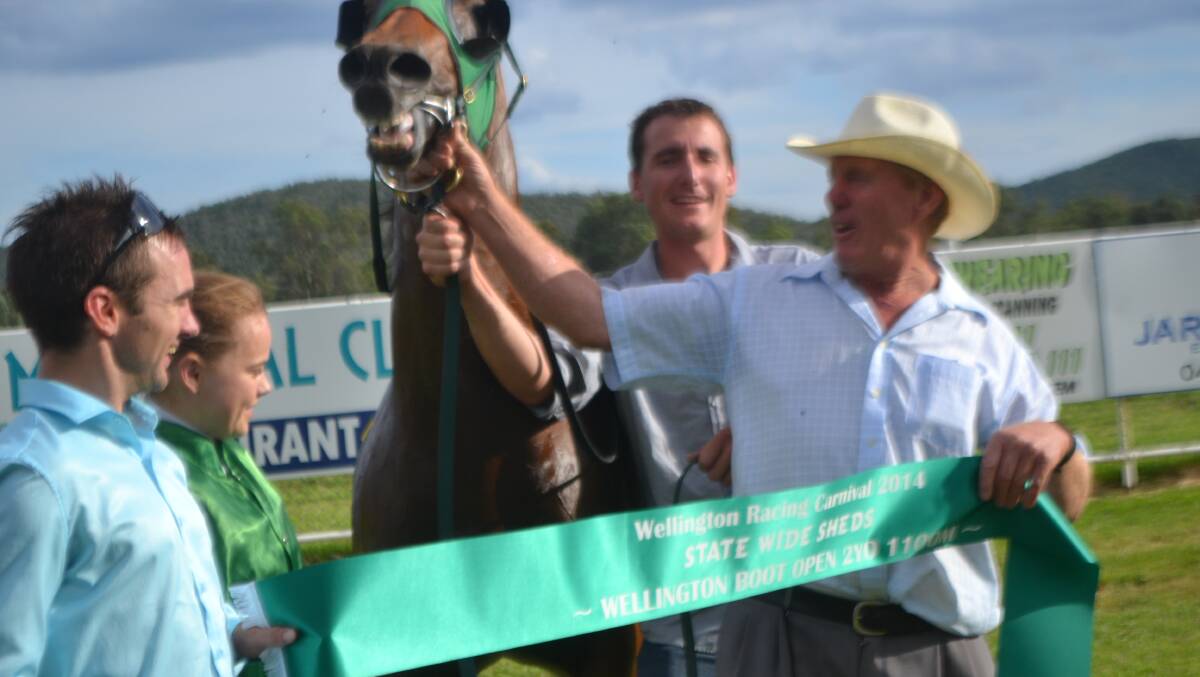 I am Snippetty gets excited after winning the Wellington Boot with his trainer Neil Osborne