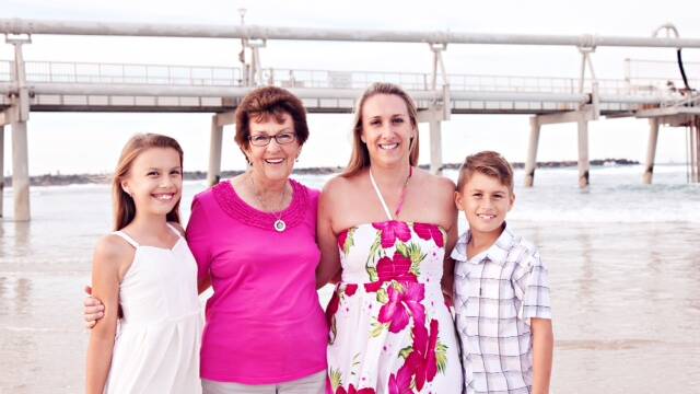Nicole Davis (centre) with her family 
