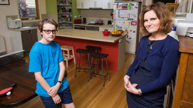 Fran Cusworth with her 12-year-old son Redmond. Fran let out her family's Melbourne home on Airbnb to help cover the cost of a family holiday to Europe. Photo: Paul Jeffers