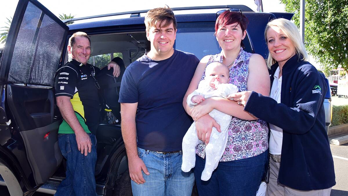 SAFETY: Neil Sturrock from Autobarn with Joseph and Thomas Smyth, Rachael Watson and Jayne Bleechmore at a child car seat safety check day last year.