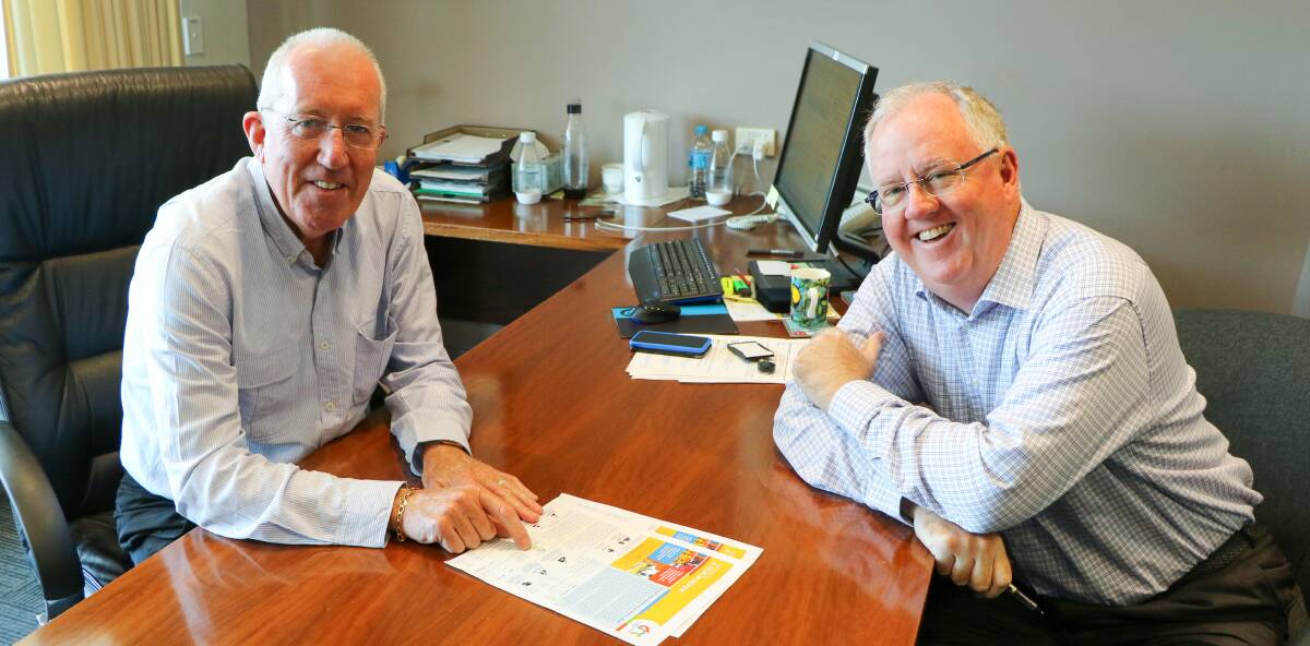 HAPPY: Dubbo Regional Council administrator Michael Kneipp and interim general manager Mark Riley are pleased with the year. Photo: SUPPLIED