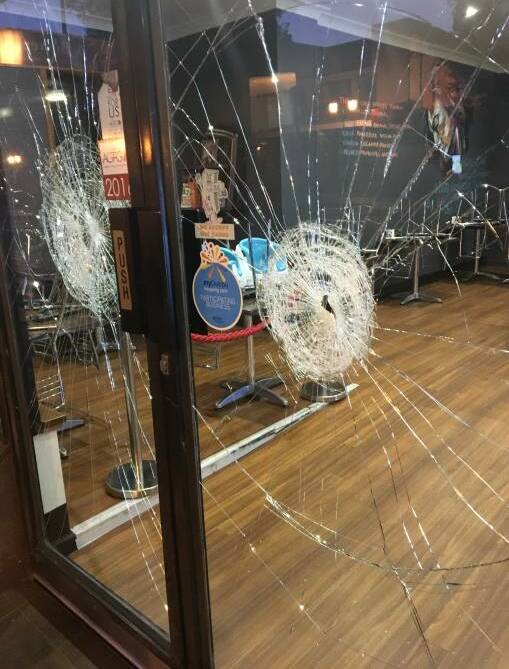 Smashed shop windows in Dubbo.