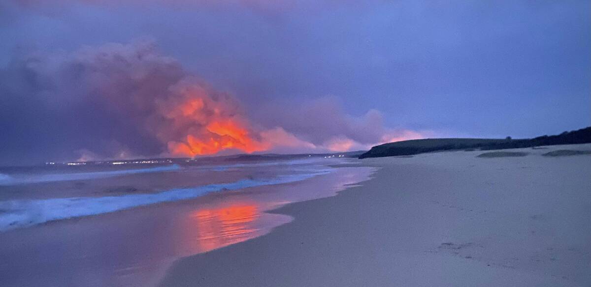 View of the Coolagolite fire from afar. Picture taken at Corunna Beach in-between Tilba and Narooma. Picture by David Allen 