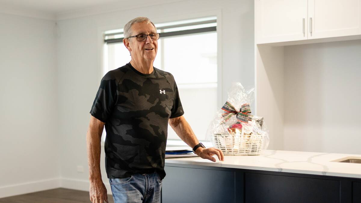 Bill Greenwood walks through his new home for the first time. Picture supplied