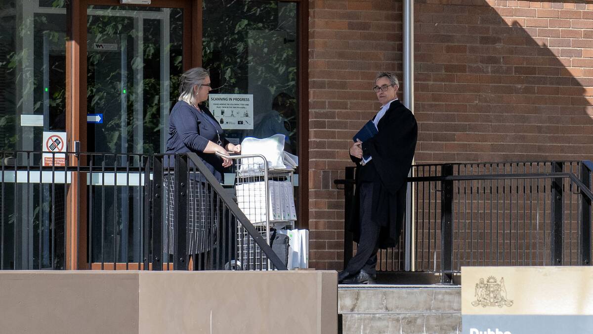 Crown prosecutor Liam Shaw (right) outside Dubbo Court as he prepares to finish his closing address. Picture by Belinda Soole